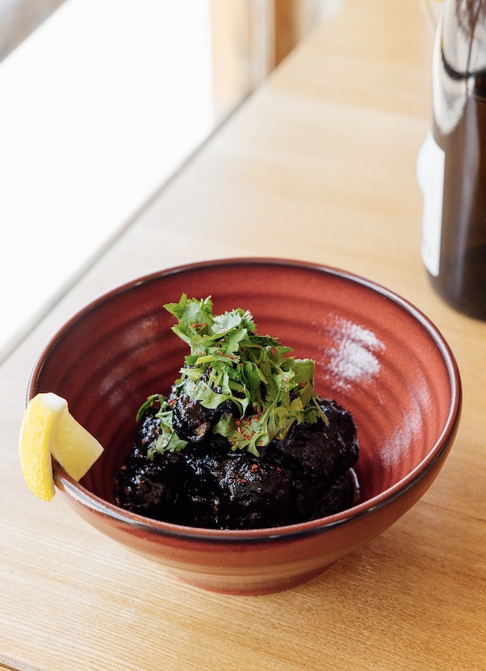 Spicy Karaage (Bamboo Charcoal Sauce, Red Arako, and Cilantro)